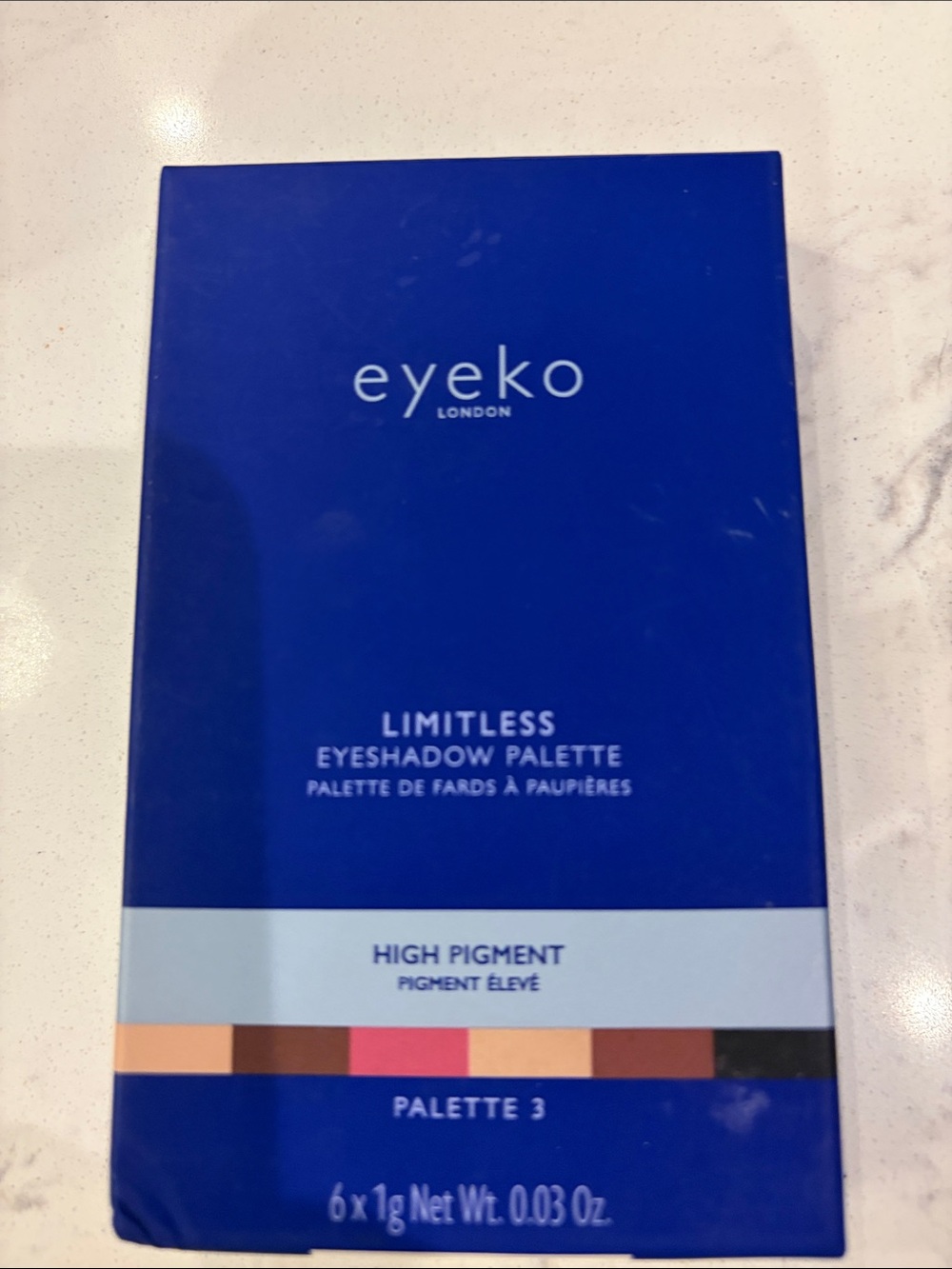 Eyeko Limitless Eyeshadow Palette — blue packaging with neutral & pink shades
